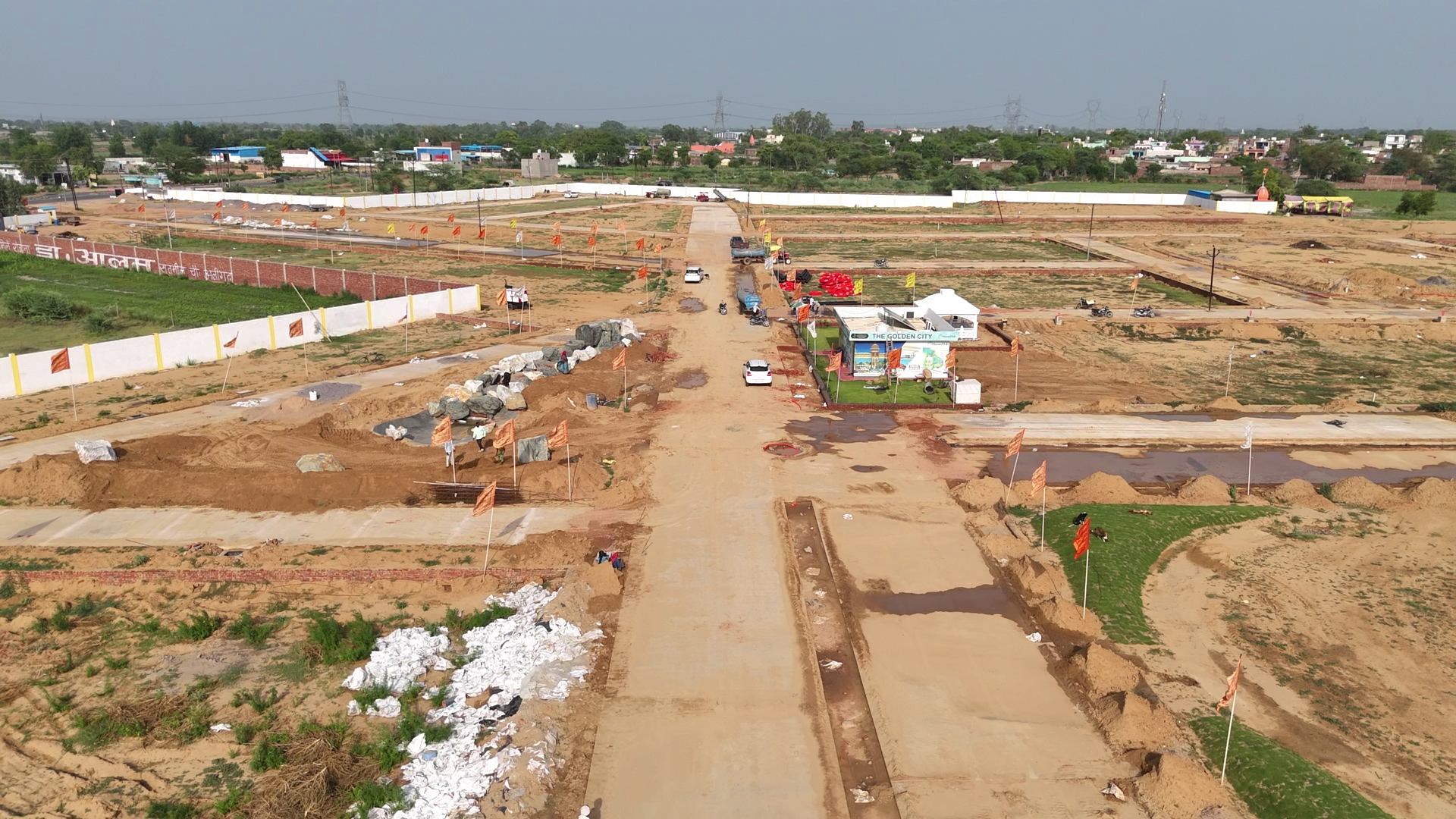 GoldenCity Township Phase 1 developed roads and demarcated plots near Noida International Airport