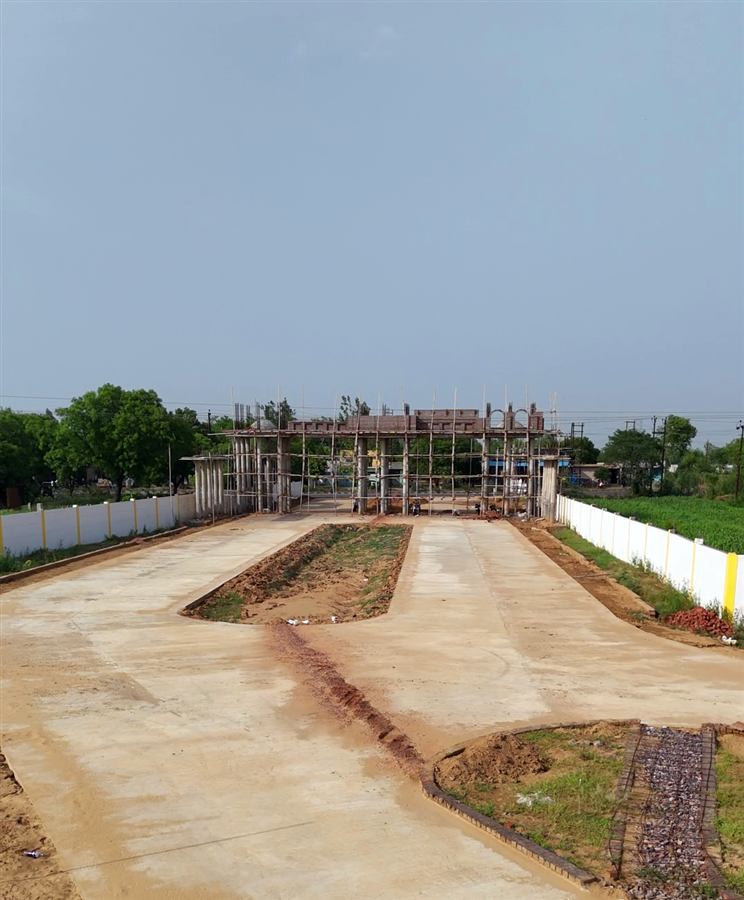 Entrance gate under construction at GoldenCity Township